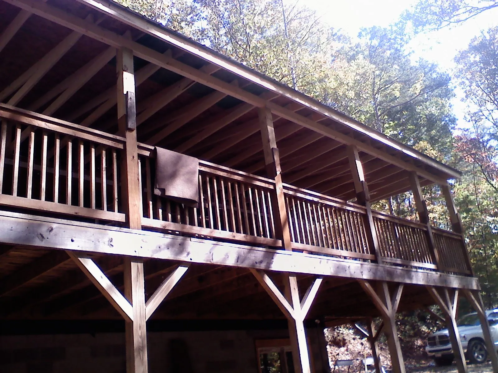 Timber framing under a new elevated porch and deck — Roof Leak Repair in Turin by Roofing Brothers